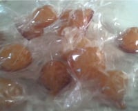 Bala de coco caramelizada