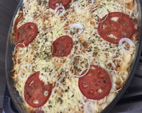 Torta de pão de forma no forno.