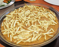 Desfiado de frango gratinado com batata palha