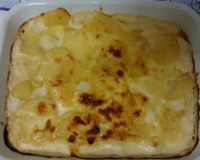 Batata gratinada cozida no leite