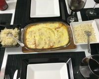 Filé de tilápia com batatas e requeijão ao forno