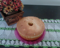 Bolo de laranja com cobertura de laranja.