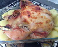 Frango assado com batatas