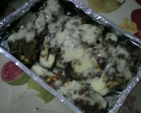 Berinjela recheada com linguiça