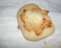 Esfiha de frango aberta