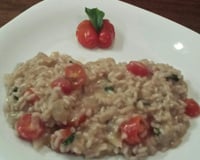 Risoto musarela de bufala, rúcula e tomate cereja
