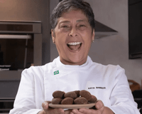Aos 40 anos, desempregada e com duas filhas, ela começou trabalhando na cozinha de um botequim e se tornou uma das chefs mais famosas do Brasil