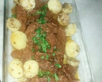 Carne na panela de pressão com cebola