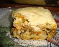 Torta assada de pão de fôrma recheada com creme de milho e frango