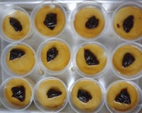 Manjar branco com calda de ameixas