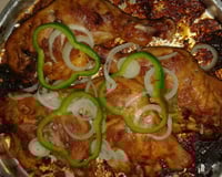 Coxa e sobrecoxa de frango assado