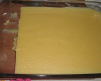 Polenta com carne e talo de espinafre