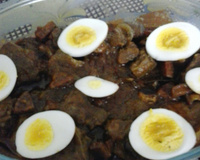 Lingua ao molho de madeira