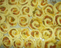 Caracóis de presunto e queijo