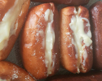 Sonho creme com bisnaguinha