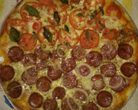 Pizza de forno ou churrasqueira