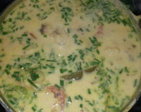 Peixe ao molho de tomate e leite de coco