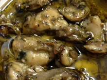 Ostras em óleo de ervas