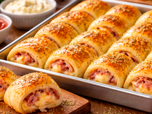 Gastei R$6,00 para fazer uma massa que me rendeu 52 enroladinhos": receita delícia de queijo com presunto para comer ou vende