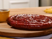 Linguiça caramelizada na cerveja