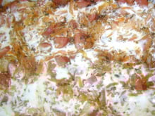 Escondido de arroz com linguiça ao creme