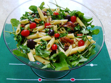 Penne com tomates secos e rúcula da Abima