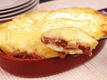 Escondidinho de carne seca com purê cremoso e charque no ponto certo