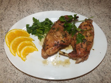 Coelho assado ao molho de laranja