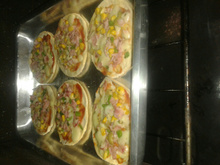 Minipizza de queijo e presunto