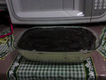 Torta de biscoito com maracujá e cobertura de chocolate