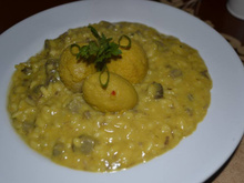 Risoto de pequi com cubinhos de carne de sol