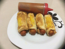 Enrolado de salsicha no pão de forma