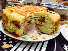 Bolo de pizza do Hilton