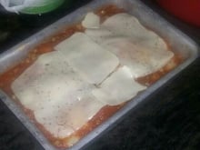 Filé de tilápia à parmegiana