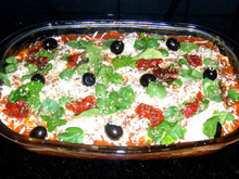 Lasanha de tomate seco e rúcula