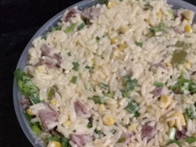 Arroz cremoso com linguiça, alho e ervas