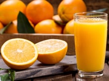 Suco de laranja com mamão