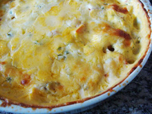Legumes gratinados com creme de queijo