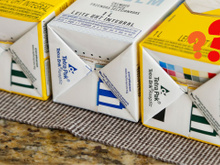 Leite reprocessado? O que significam os quadrados coloridos no fundo da caixa de leite