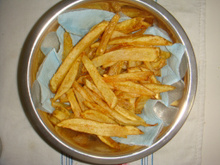 Batata frita com queijo parmesão