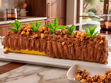 Uma sobremesa espetacular que parece de confeitaria, mas é mais fácil do que você imagina: rocambole espanhol de chocolate e avelã com uma massa fofinha e um recheio cremoso de chocolate amargo