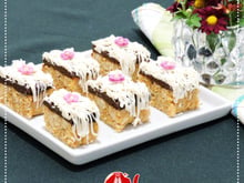 Cocadinha de biscoito champanhe e coco queimado da ABIMAPI