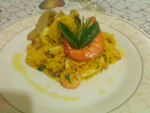 Risoto de frutos do mar com batata assada