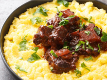 Rabada com polenta e agrião