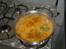 Peixe ao molho de camarão e leite de coco