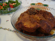 Pernil ao molho de cebola