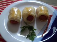 Delicioso mini cachorro quente de forno