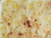 Creme de milho com queijo e palmito, gratinado