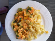 Camarão flambado ao molho de coco