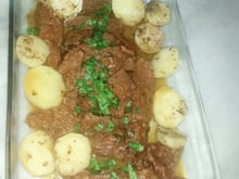 Carne na panela de pressão com cebola